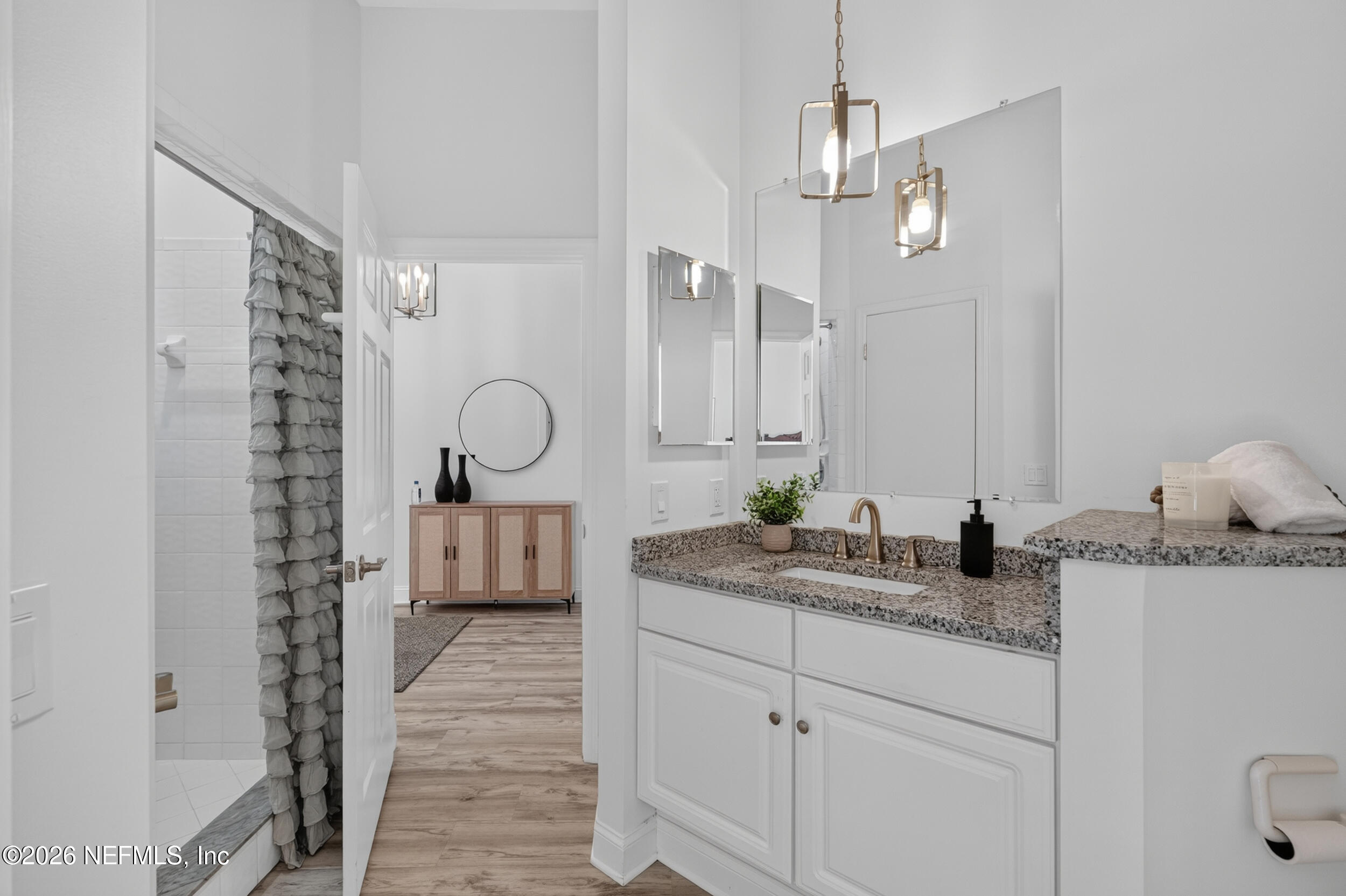 3090 Monument Bay Road St. Augustine, FL 32092 - Photo 35 of 56 a very nice looking room with a chandelier