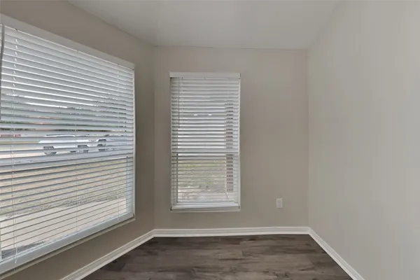 a view of a room that has a window in it