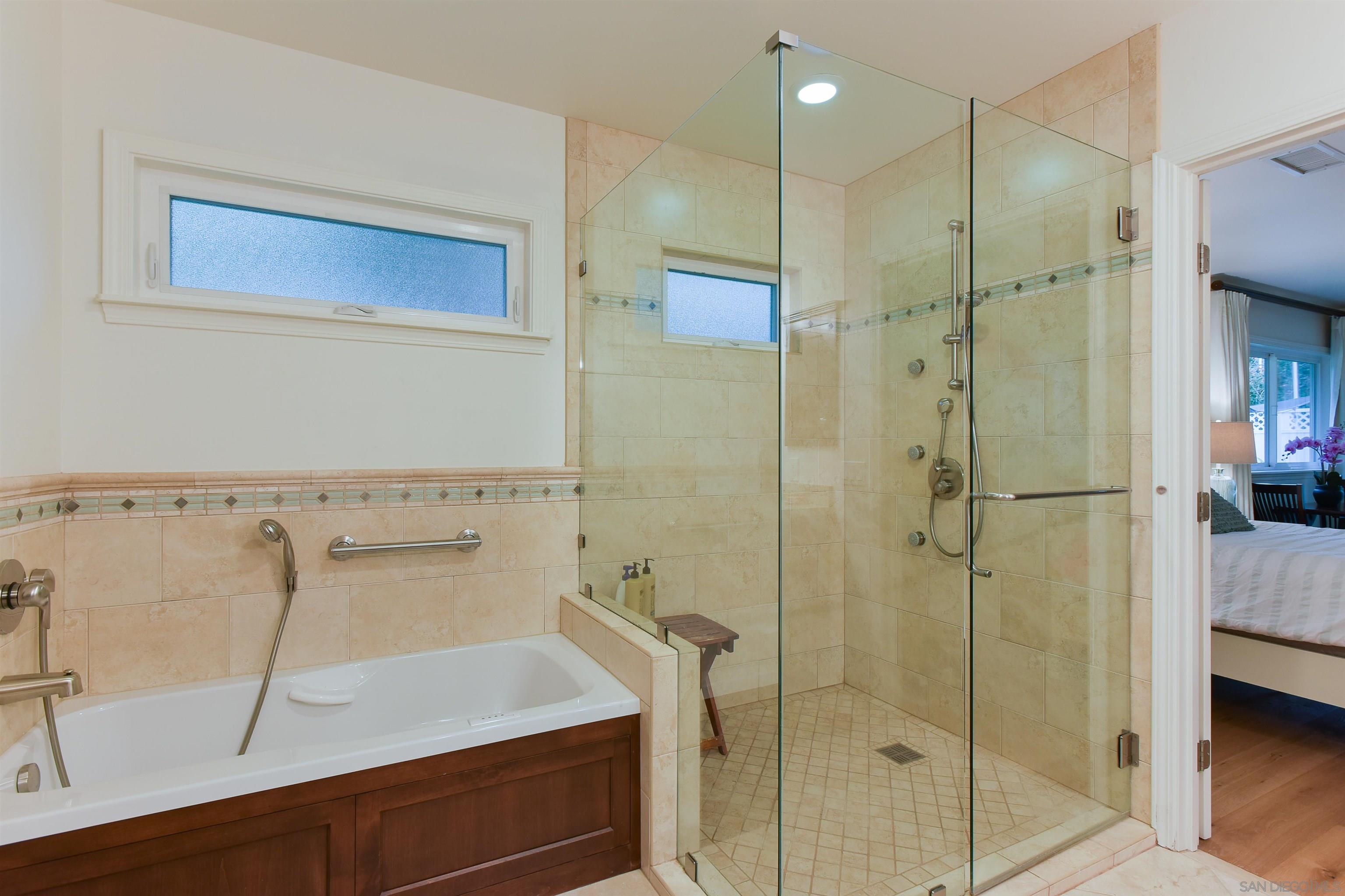 222 Barbara Avenue Solana Beach, CA 92075 - Photo 21 of 37 a bathroom with a shower and a sink