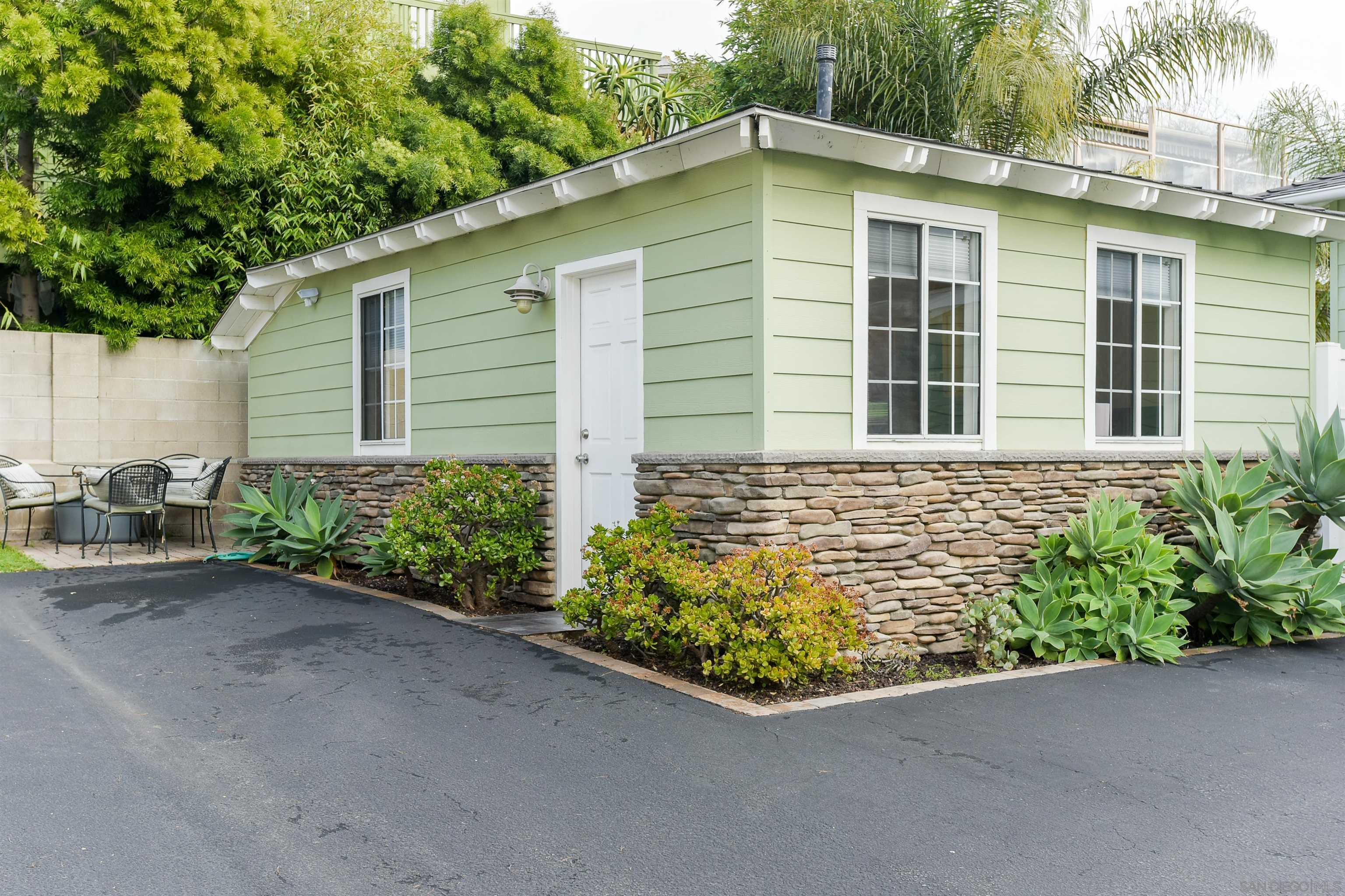 222 Barbara Avenue Solana Beach, CA 92075 - Photo 24 of 37 a front view of a house with a garden