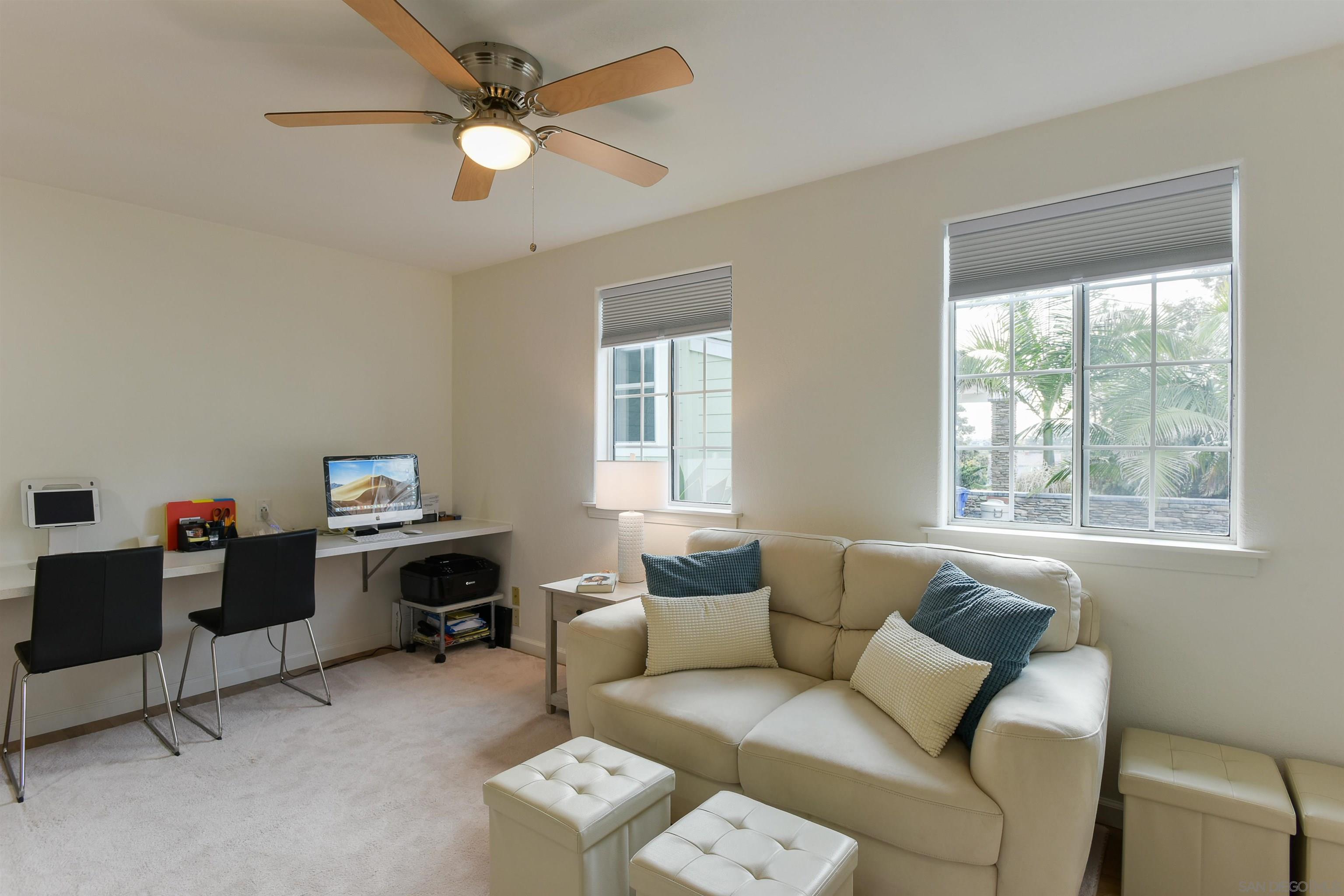 222 Barbara Avenue Solana Beach, CA 92075 - Photo 26 of 37 a living room with furniture and a window