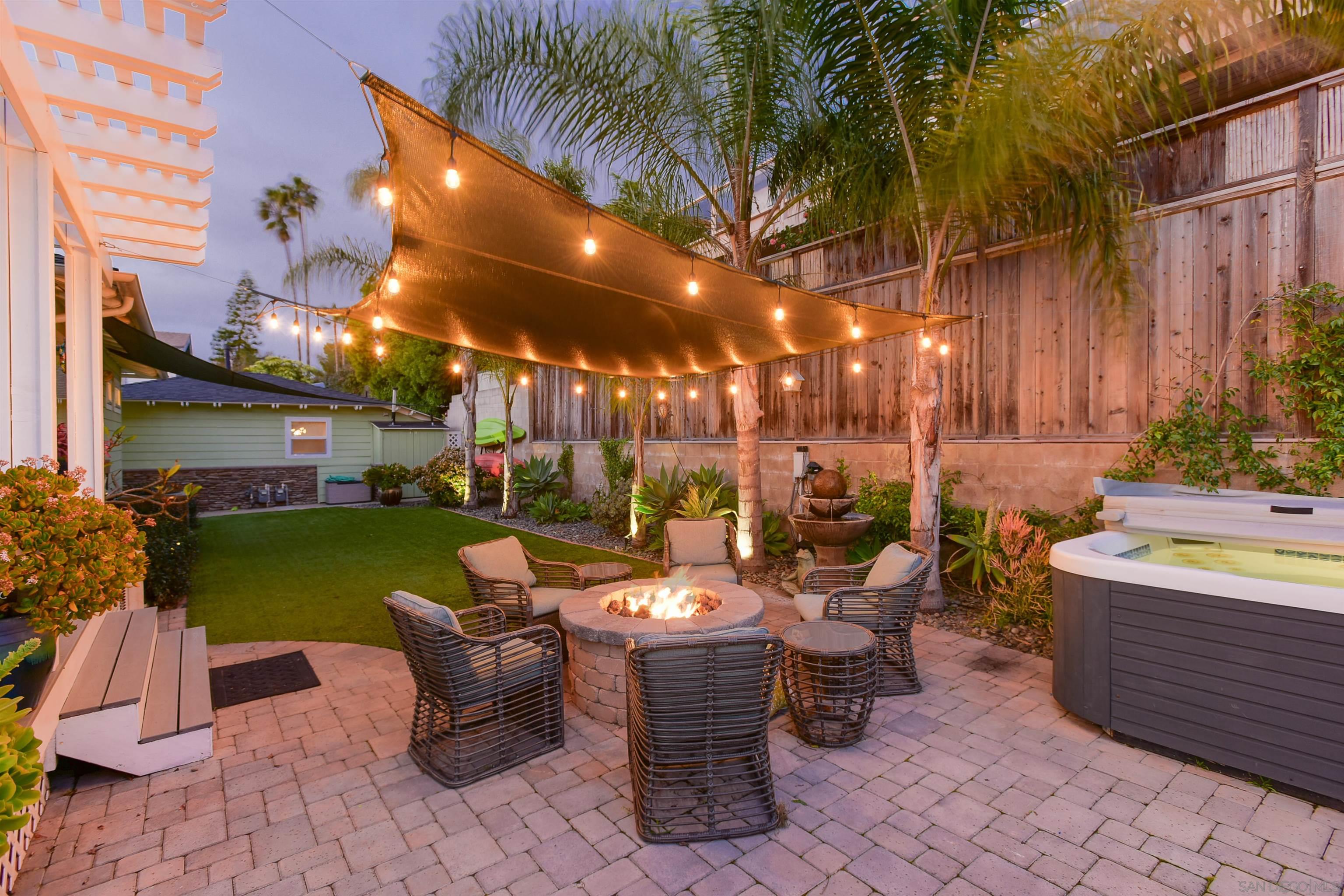 222 Barbara Avenue Solana Beach, CA 92075 - Photo 3 of 37 a view of a patio with swimming pool table and chairs