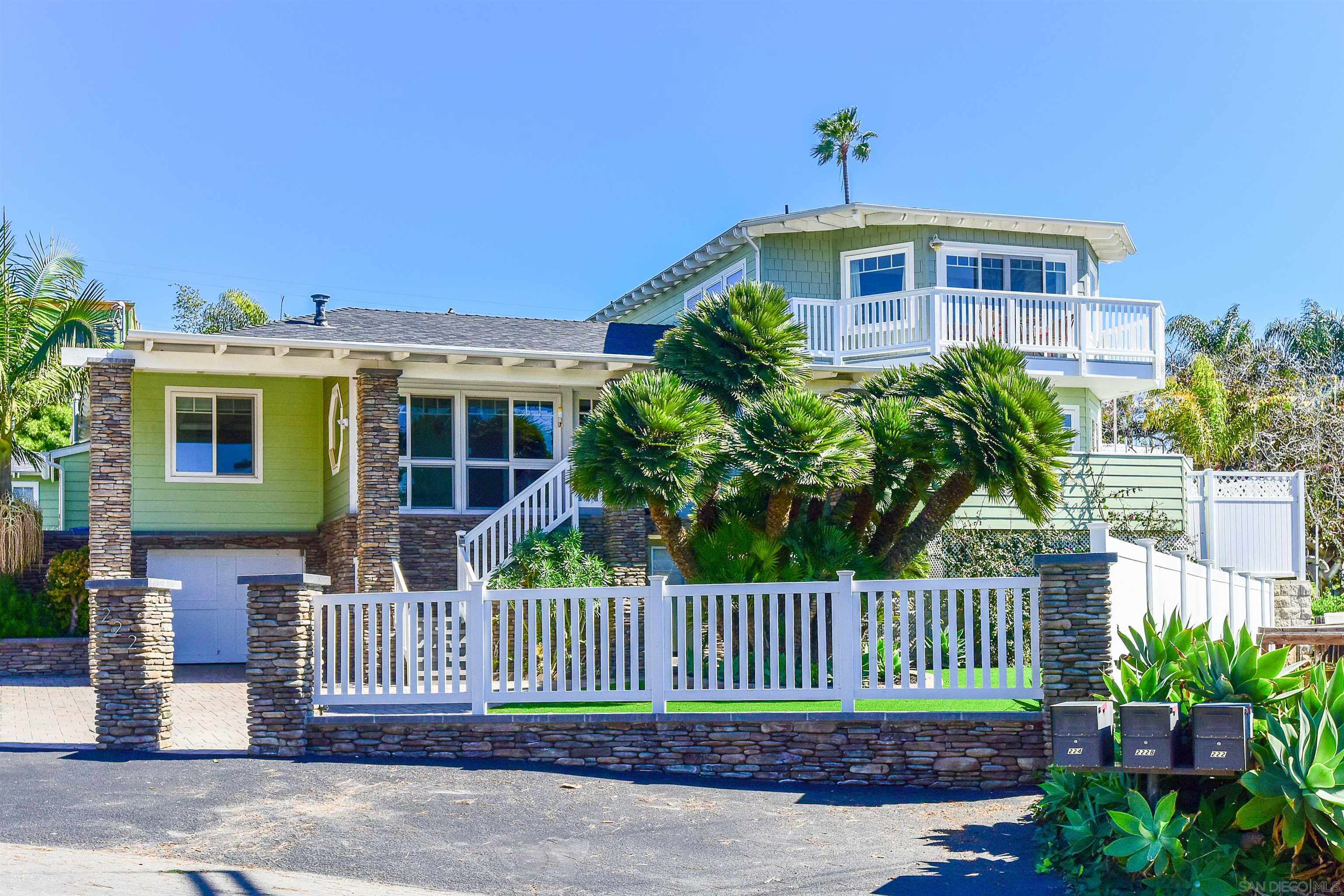 222 Barbara Avenue Solana Beach, CA 92075 - Photo 31 of 37 a front view of a house with a garden