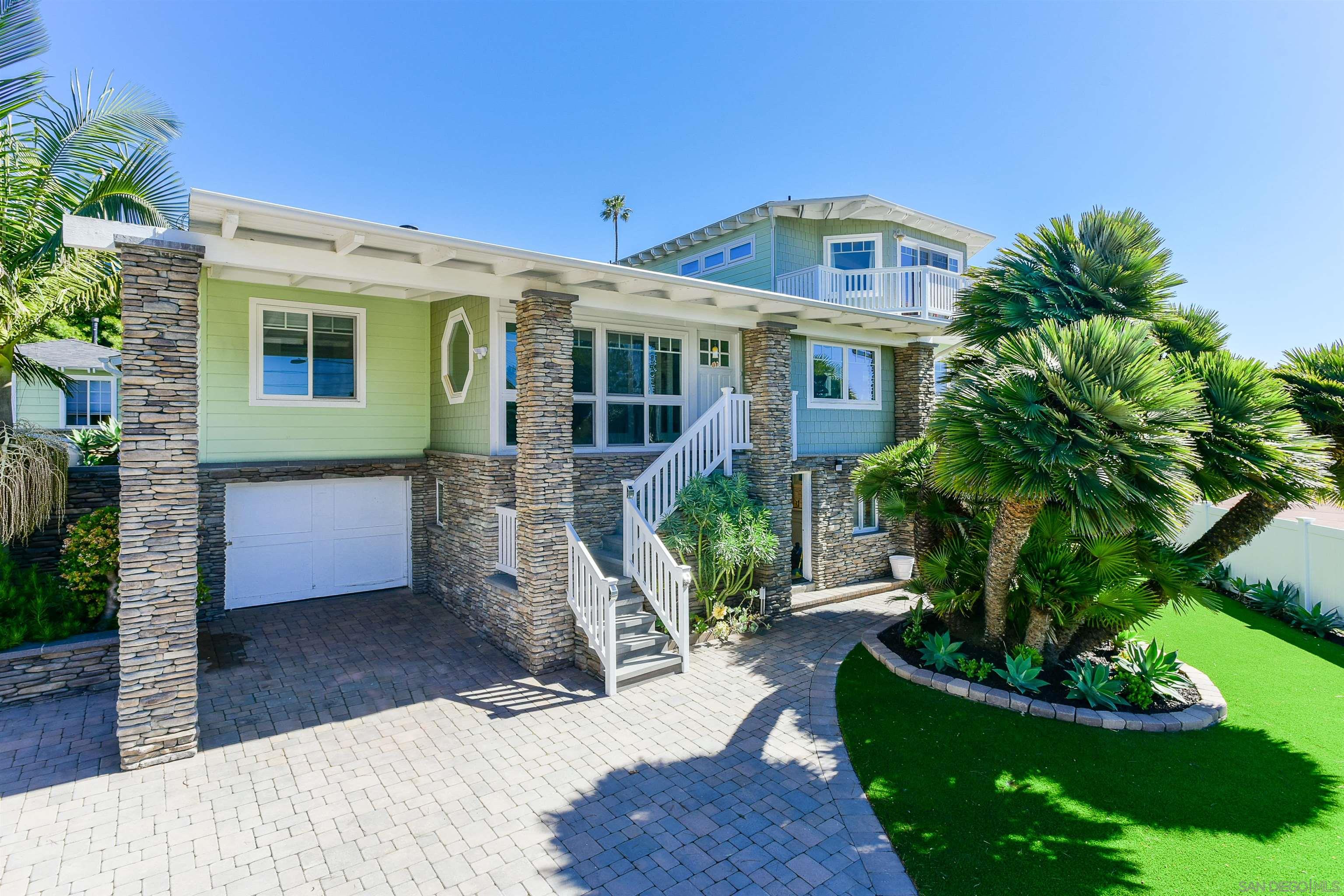 222 Barbara Avenue Solana Beach, CA 92075 - Photo 32 of 37 a front view of a house with a yard