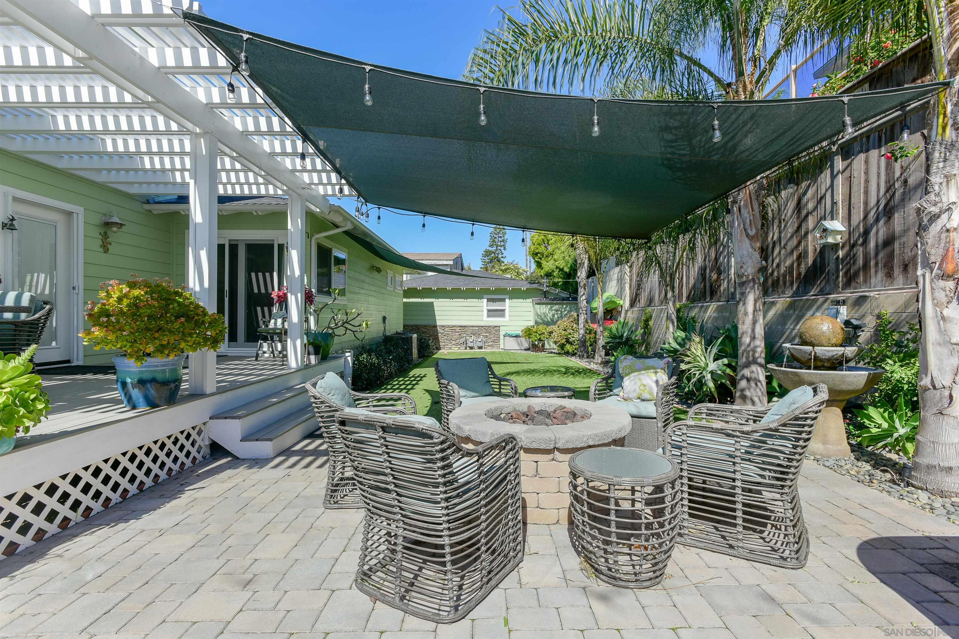 222 Barbara Avenue Solana Beach, CA 92075 - Photo 33 of 37 a view of an chairs and tables in the patio
