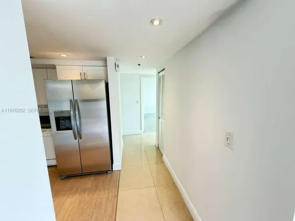 an empty room with an entryway