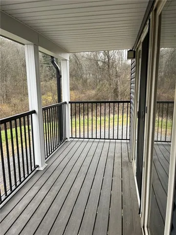 a view of a balcony with outdoor space