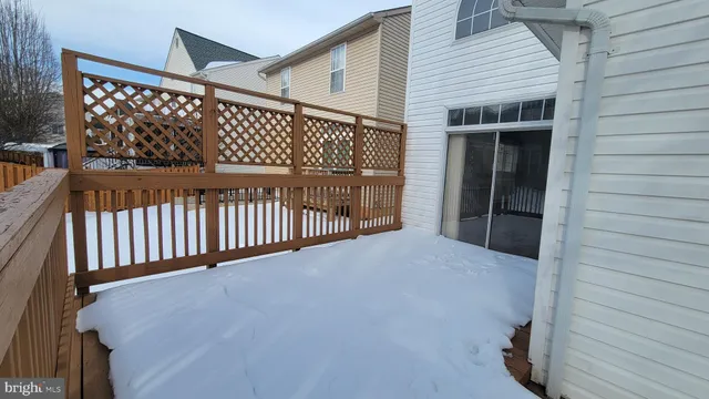 a view of backyard with seating space