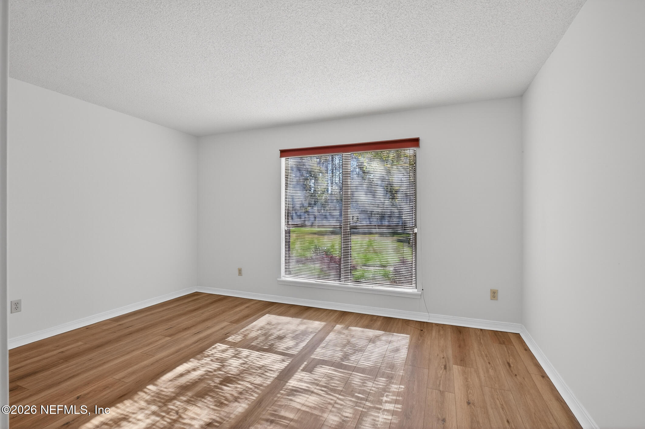 10200 Belle Rive Boulevard, Unit 105 Jacksonville, FL 32256 - Photo 26 of 47 an empty room with a window
