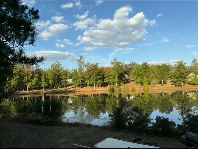 a view of a lake from a yard