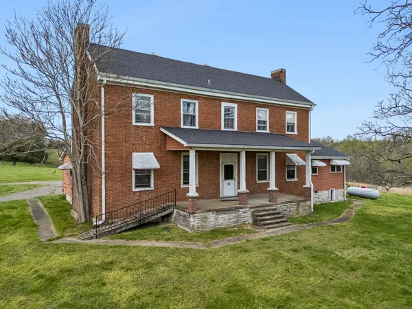 a front view of house with yard