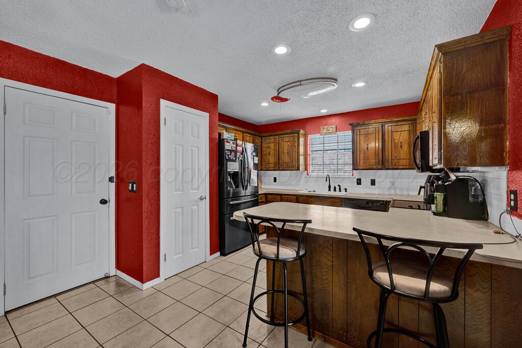 5215 South Milam Street Amarillo, TX 79110 - Photo 2 of 15 kitchen 1