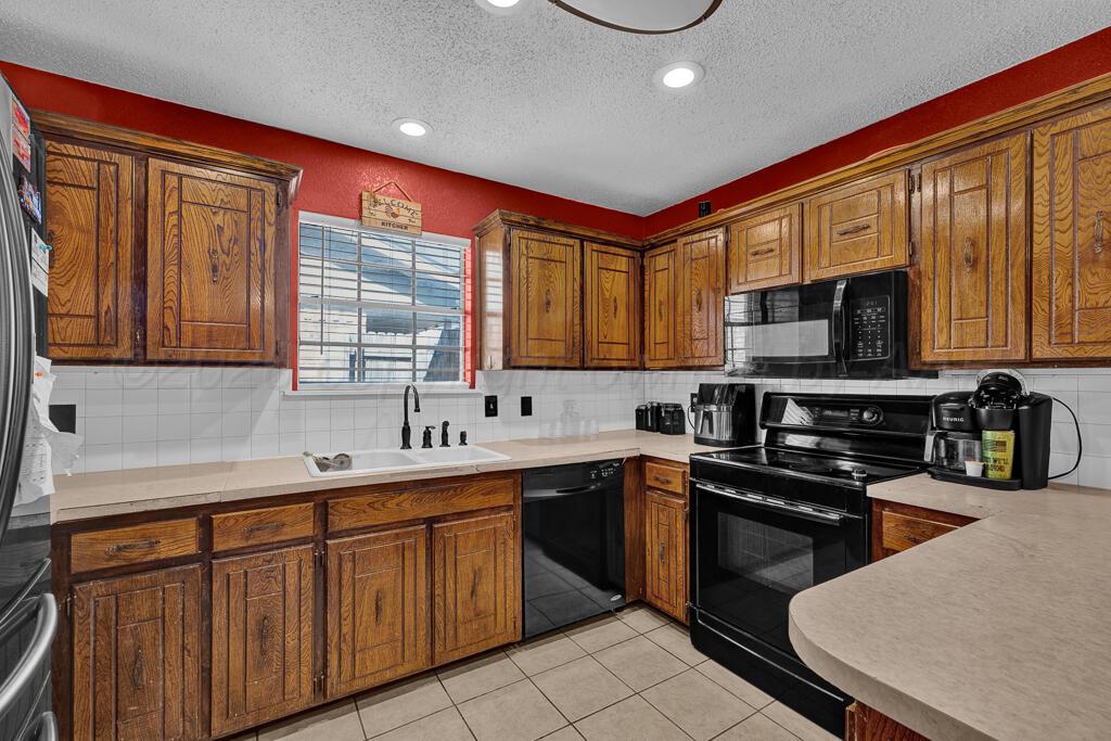 5215 South Milam Street Amarillo, TX 79110 - Photo 3 of 15 kitchen 2