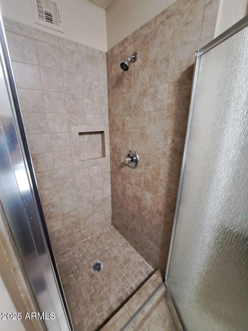 834 South Casitas Drive, Unit B Tempe, AZ 85288 - Photo 12 of 23 a bathroom with a shower