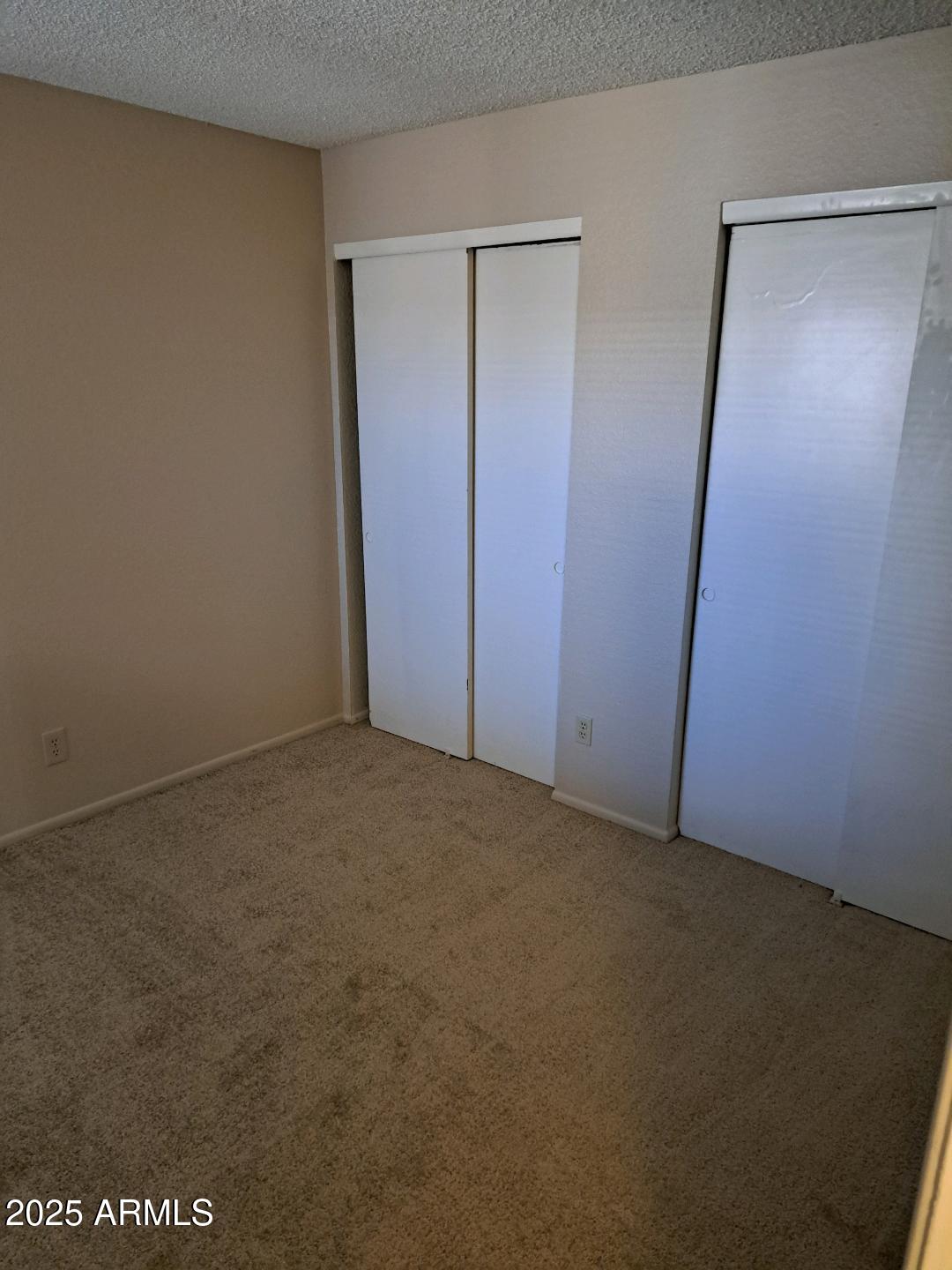 834 South Casitas Drive, Unit B Tempe, AZ 85288 - Photo 20 of 23 an empty room with an empty space