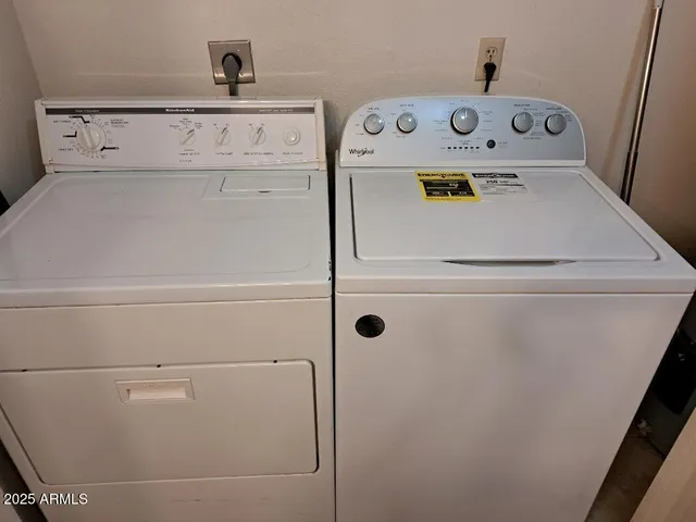 a utility room with dryer and washer
