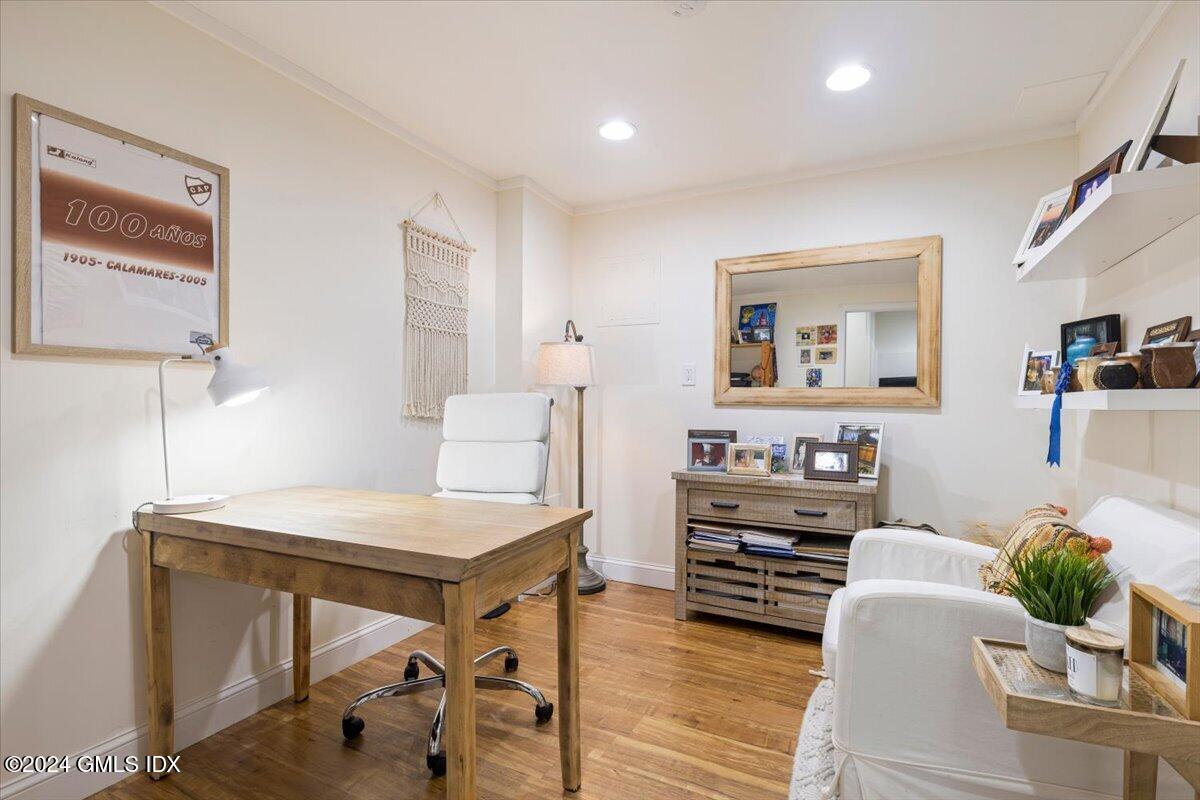70 Gregory Road Cos Cob, CT 06807 - Photo 27 of 39 a living room with furniture and wooden floor