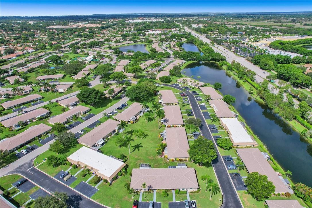 20830 Wendall Terrace, Unit 58 Boca Raton, FL 33433 - Photo 5 of 27 an aerial view of residential houses with outdoor space