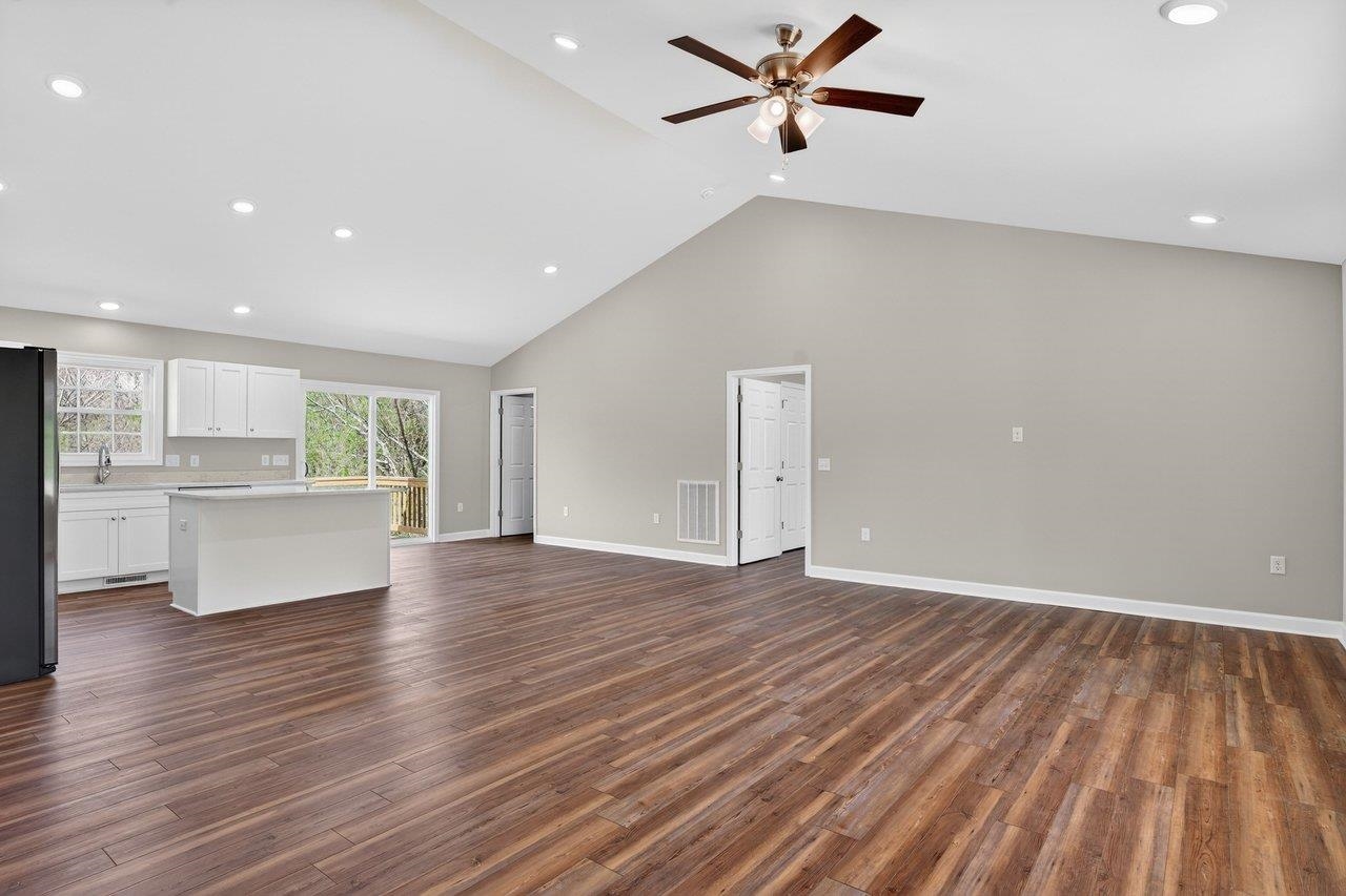 254 Locustdale Loop Shenandoah, VA 22849 - Photo 13 of 58 a view of empty room with wooden floor and window