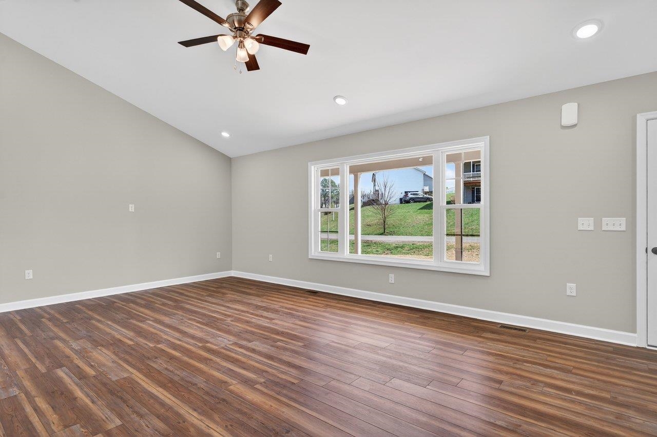 254 Locustdale Loop Shenandoah, VA 22849 - Photo 14 of 58 wooden floor in an empty room with a window