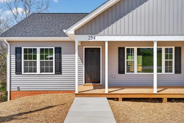 a view of a house with a lounge chair