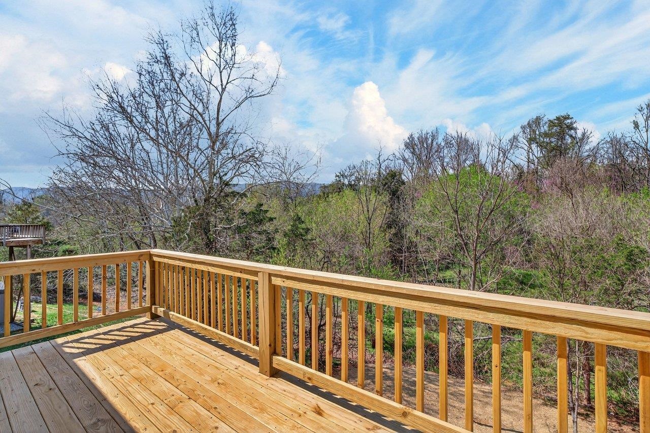 254 Locustdale Loop Shenandoah, VA 22849 - Photo 24 of 58 a view of balcony with wooden floor and fence
