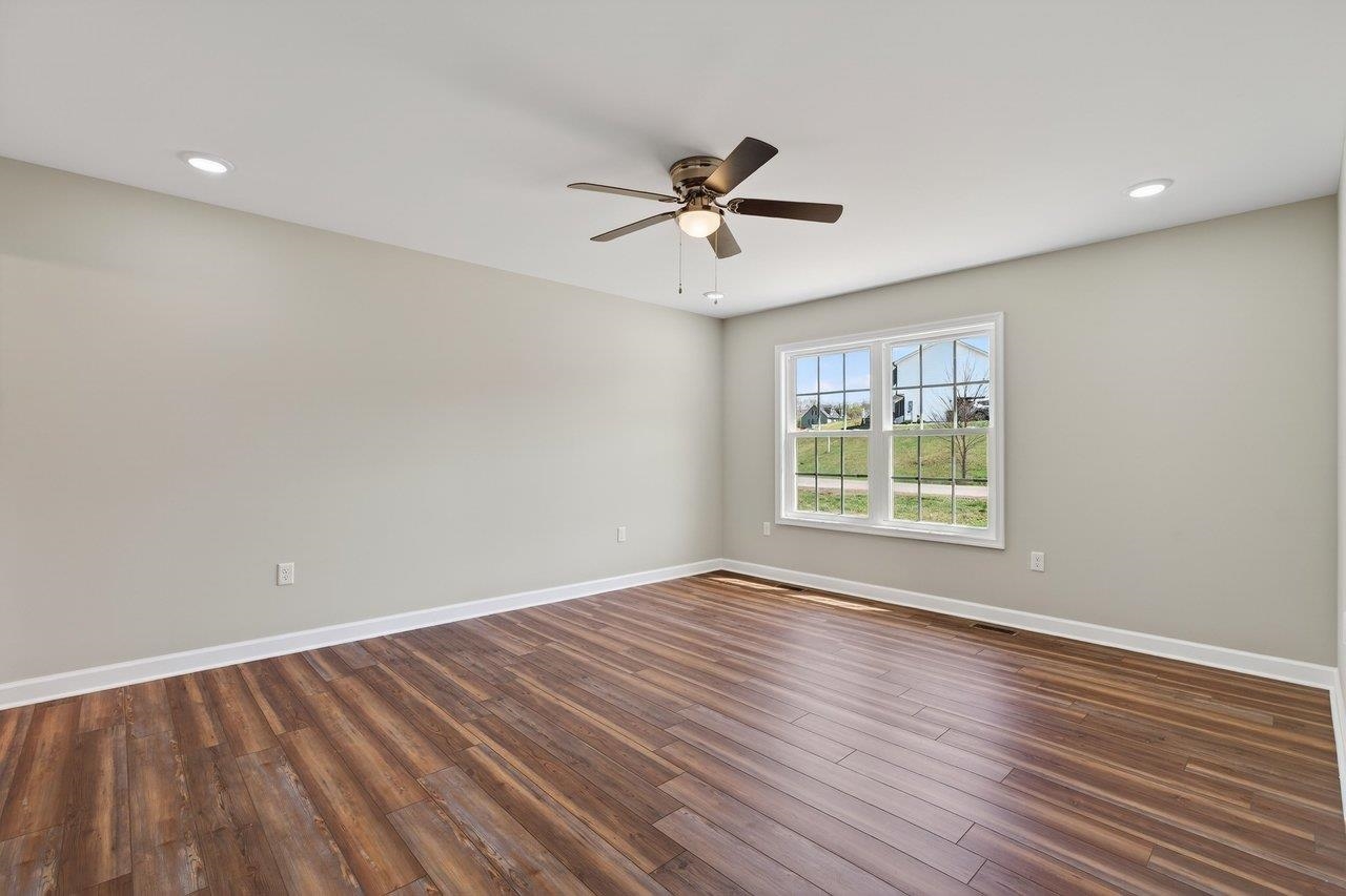 254 Locustdale Loop Shenandoah, VA 22849 - Photo 29 of 58 wooden floor in an empty room with a window