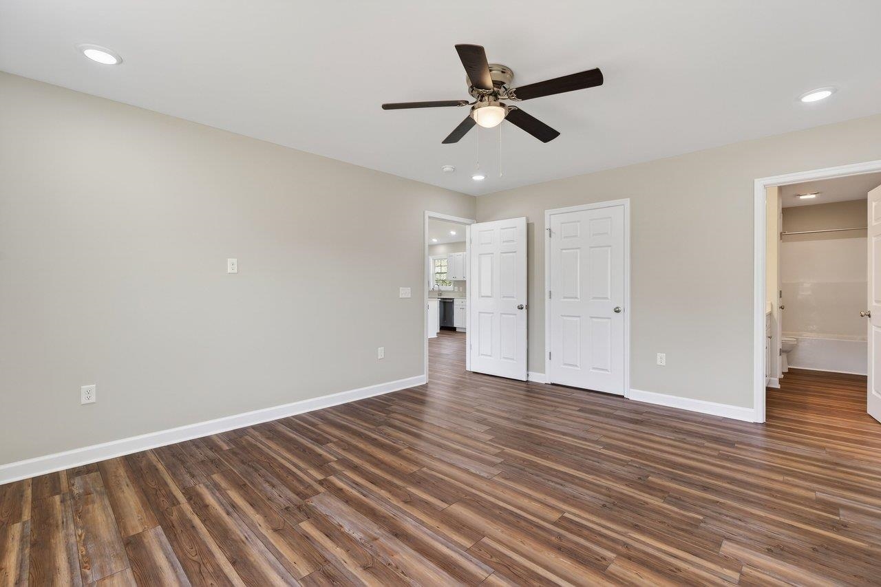 254 Locustdale Loop Shenandoah, VA 22849 - Photo 31 of 58 wooden floor in an empty room with a window