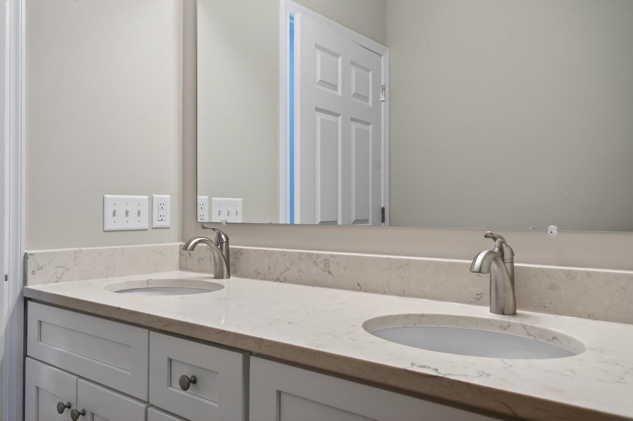 254 Locustdale Loop Shenandoah, VA 22849 - Photo 34 of 58 a bathroom with a sink and a mirror