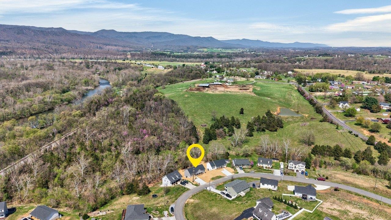 254 Locustdale Loop Shenandoah, VA 22849 - Photo 58 of 58 a view of a lake with a mountain