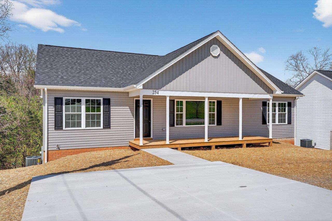 254 Locustdale Loop Shenandoah, VA 22849 - Photo 6 of 58 a front view of a house with a yard