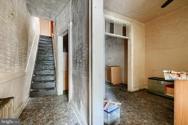 a view of an entryway with stairs