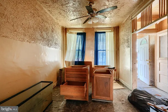 a room with furniture and a window