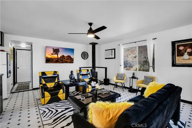 a kitchen with stainless steel appliances granite countertop a refrigerator and a stove