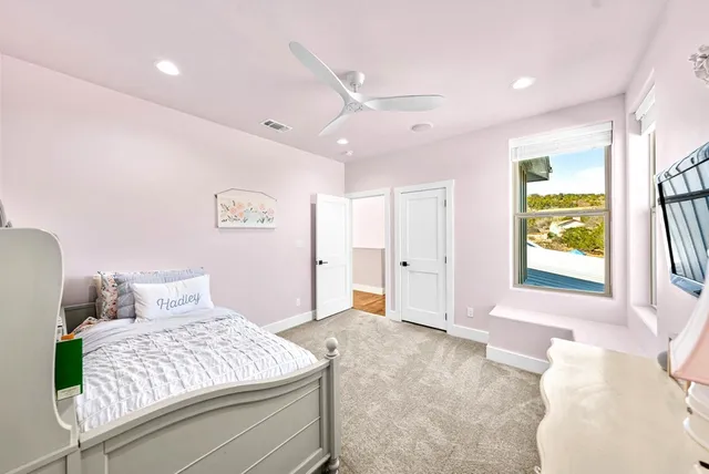 a aerial view of a house with pool