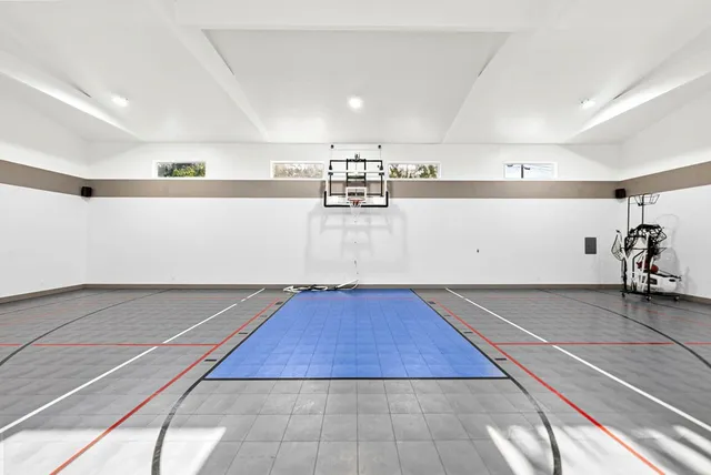 a view of a porch with chairs and backyard