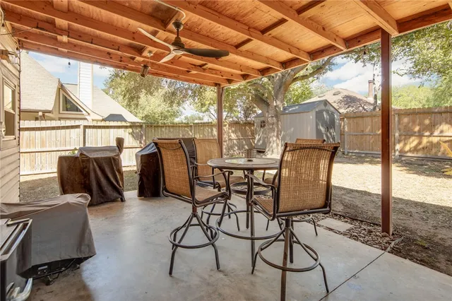 a view of an outdoor space with furniture