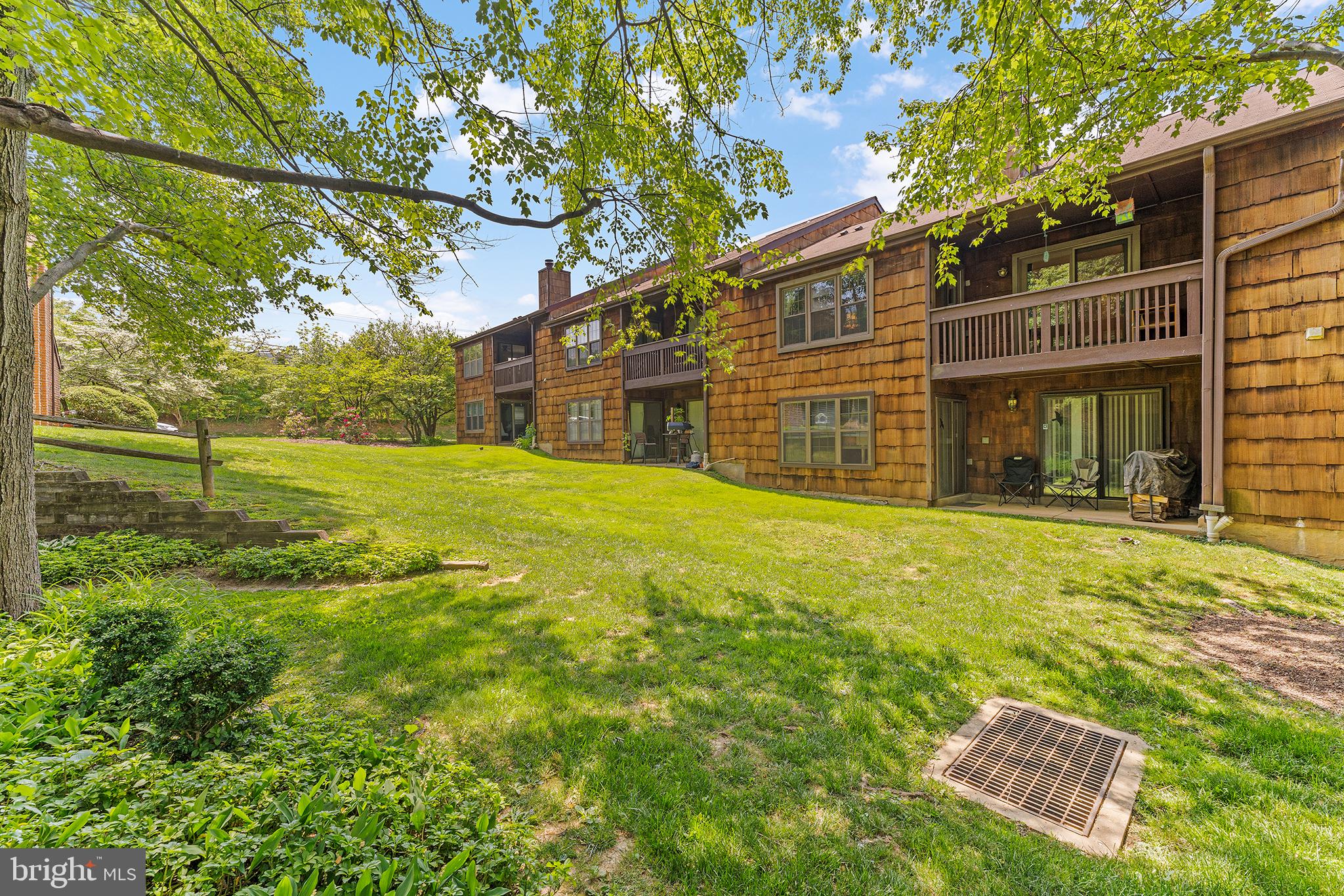 12 Rittenhouse Court, Unit 185 Chesterbrook, PA 19087 - Photo 3 of 12 a view of a house with a yard