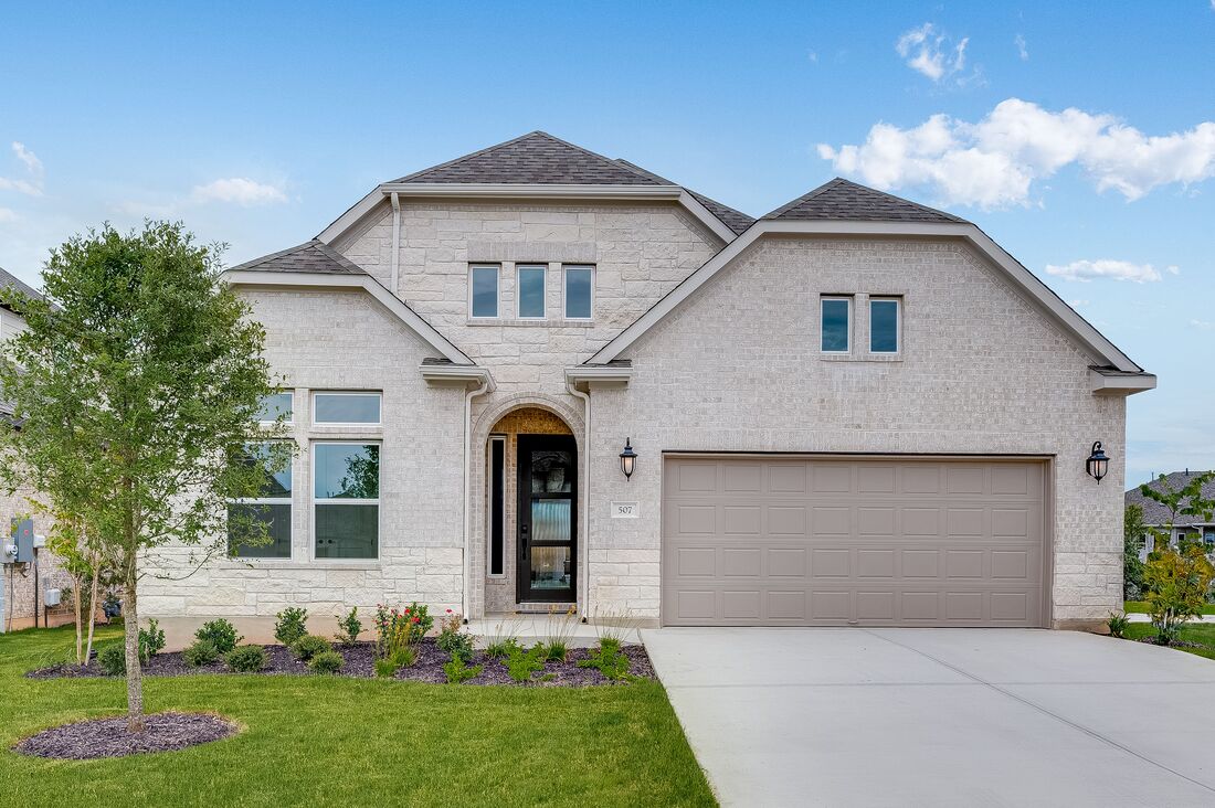 507 Clove Current Court Georgetown, TX 78633 - Photo 1 of 1 a front view of a house with a yard