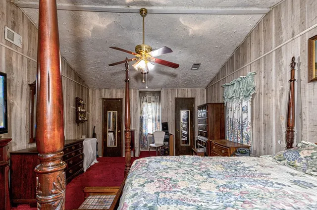 a bathroom with a sink toilet and a mirror
