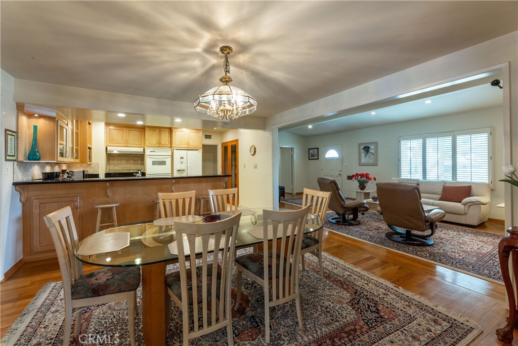 1401 Hackett Avenue Long Beach, CA 90815 - Photo 16 of 48 a view of a dining room with furniture