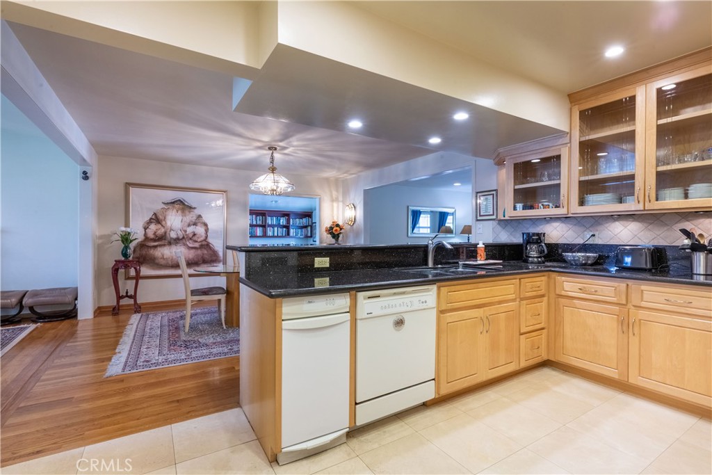 1401 Hackett Avenue Long Beach, CA 90815 - Photo 20 of 48 a large kitchen with lots of counter space and windows
