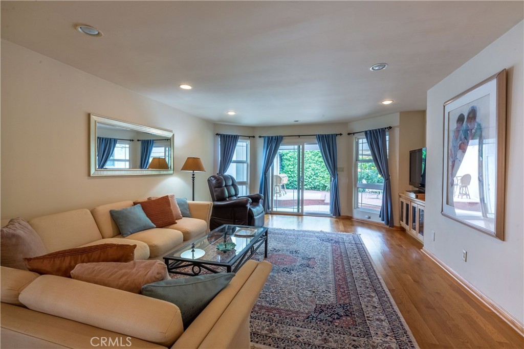 1401 Hackett Avenue Long Beach, CA 90815 - Photo 23 of 48 a living room with furniture and a wooden floor