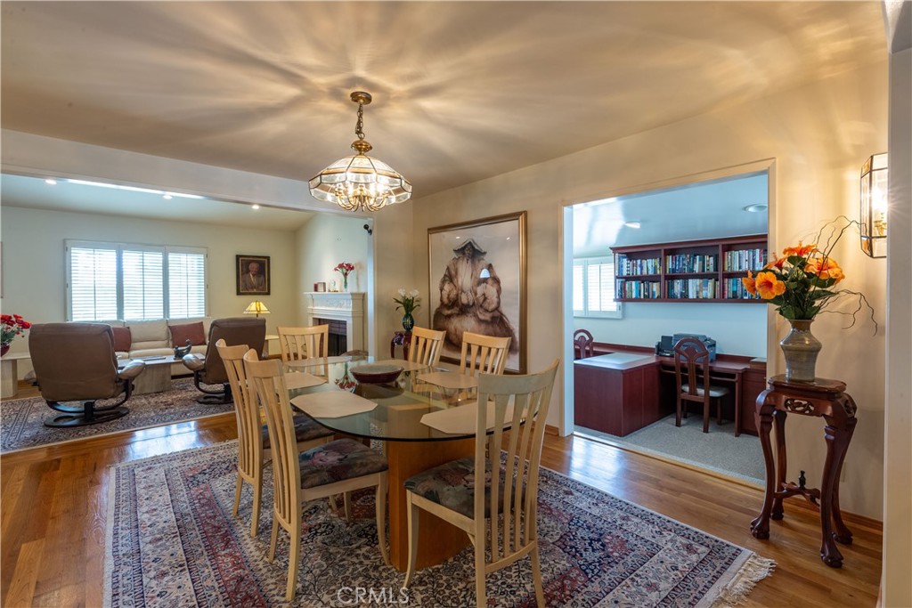 1401 Hackett Avenue Long Beach, CA 90815 - Photo 24 of 48 a view of a dining room with furniture window and wooden floor