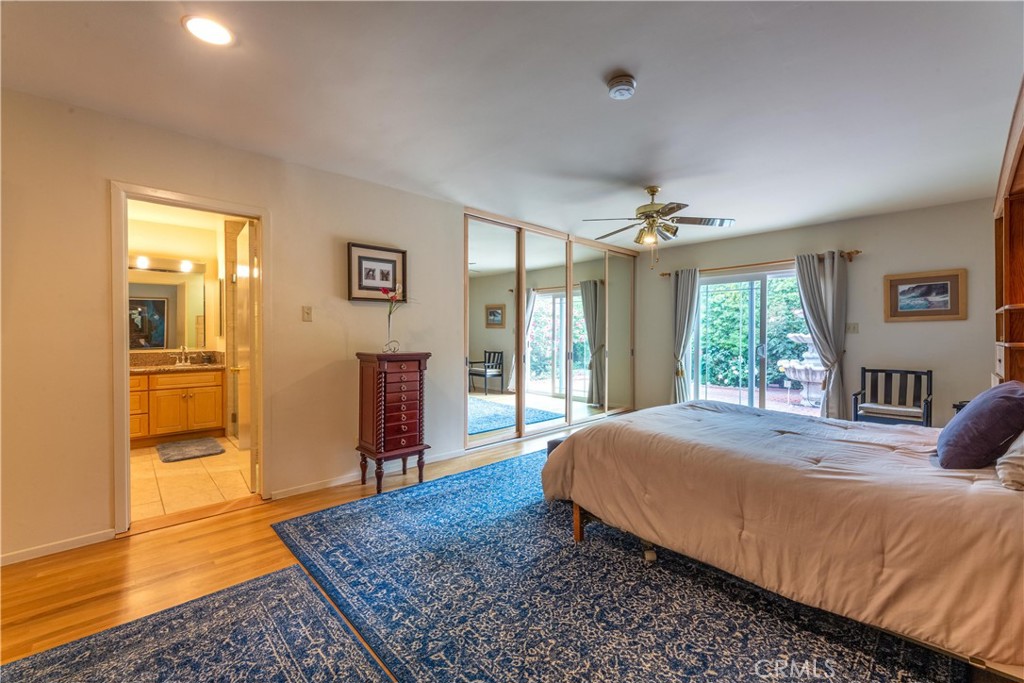 1401 Hackett Avenue Long Beach, CA 90815 - Photo 36 of 48 a bed sitting in a spacious bedroom next to a window