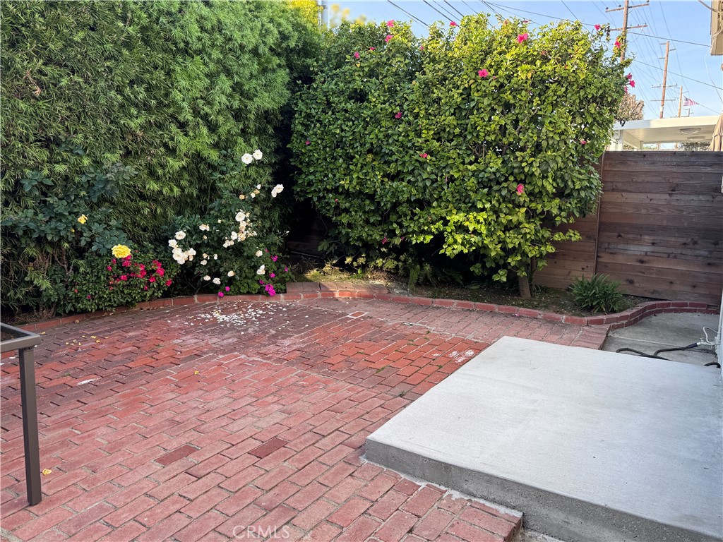 1401 Hackett Avenue Long Beach, CA 90815 - Photo 44 of 48 a view of a yard with plants and trees