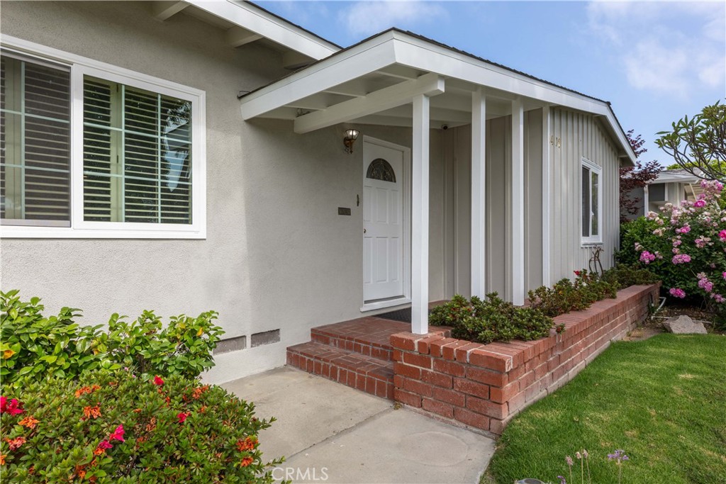 1401 Hackett Avenue Long Beach, CA 90815 - Photo 9 of 48 a front view of a house with a yard