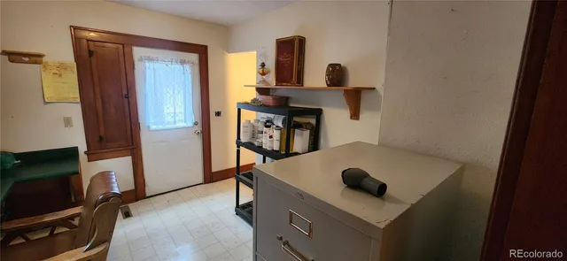 a room with workbench and window