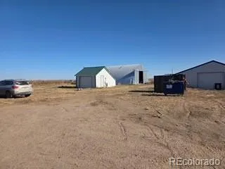 a view of swimming pool with a yard