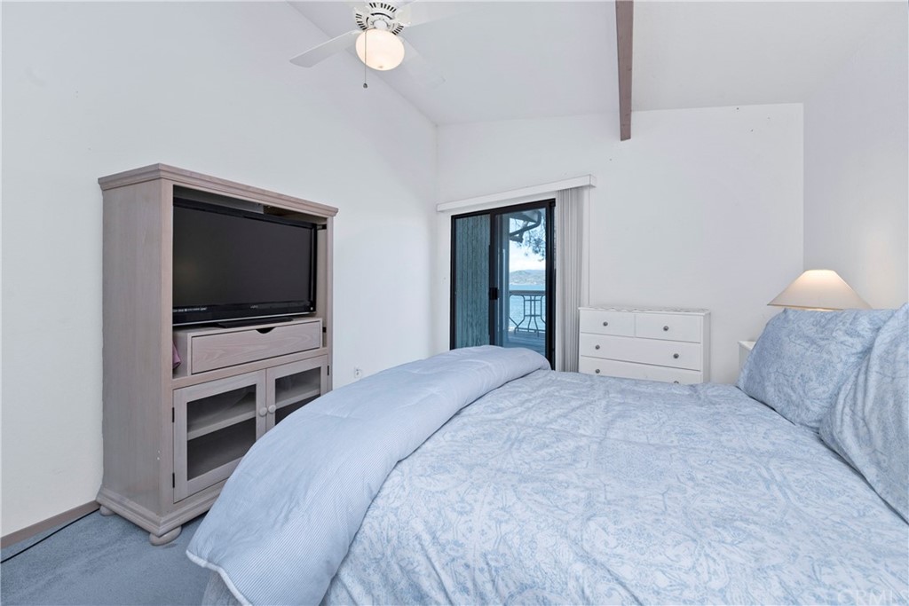 5191 Lake Boulevard Lower Lake, CA 95457 - Photo 15 of 44 a bedroom with a bed and a flat screen tv